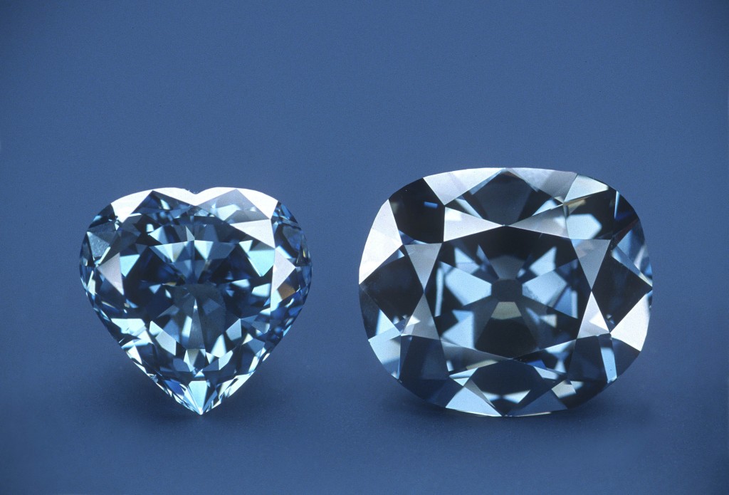 Photo: The Hope Diamond, right, without its white-diamond pendant, and the 30.62 carat Blue Hart Diamond.