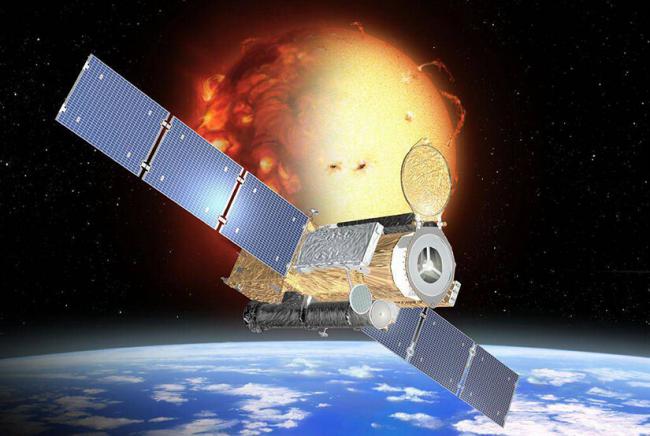 Click to view larger image Artistic representation of the Hinode spacecraft with the Earth and sun in background.