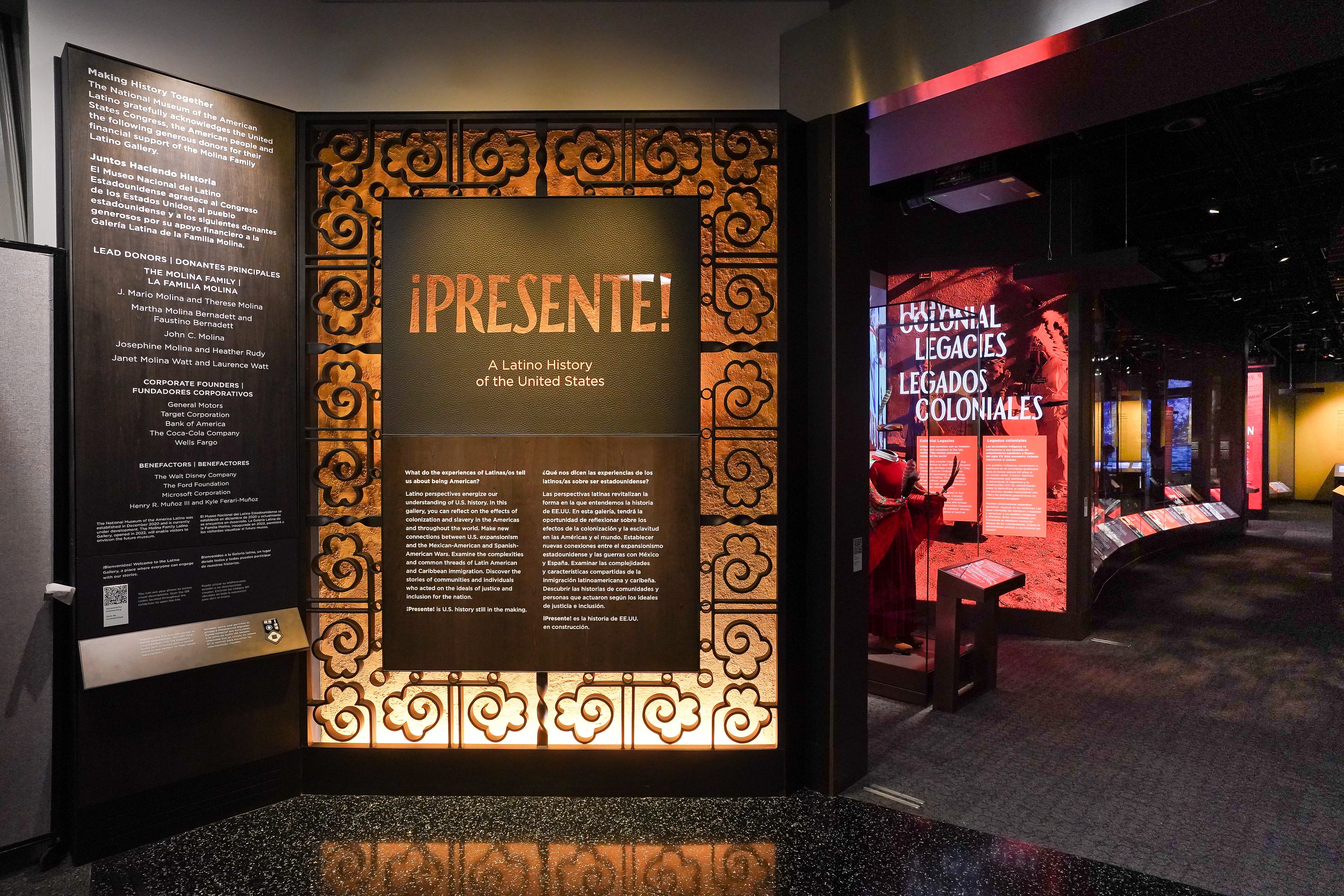 Entrance to museum exhibit Presente with introductory wall text
