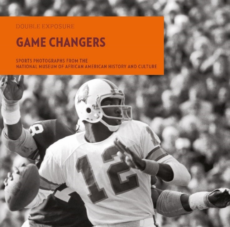 Cover of book with black and white image of football player about to throw a football.