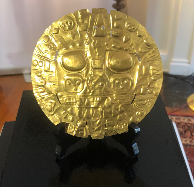 Gold ornament on a stand