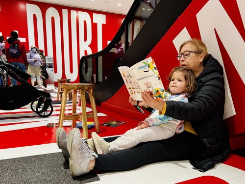 Older woman reading to a child