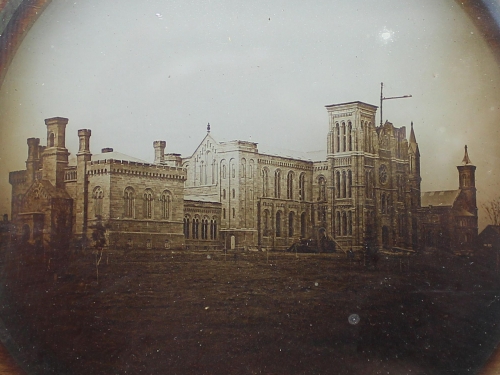 Lantern slide with earliest known photo of the Smithsonian Castle.