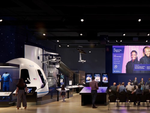 Computer rendering of a museum gallery with a large screen and chairs in front