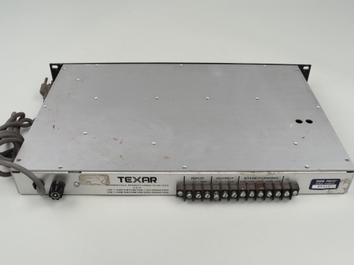 Small rectangular metal technological device.