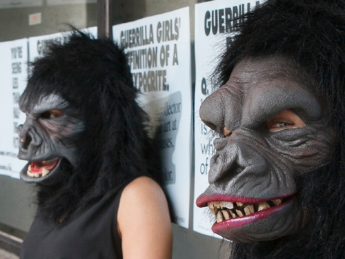 Talking To Our Time graphic with image of three women dressed in gorilla masks