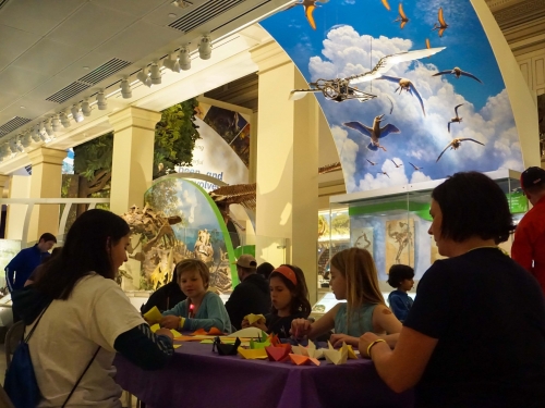 Children and parents enjoying Night at the Museum event