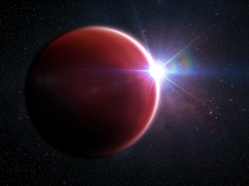 Planet with star shining behind it