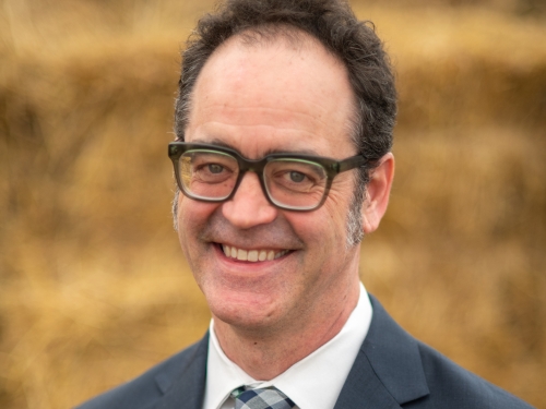 Man in suit with plaid tie