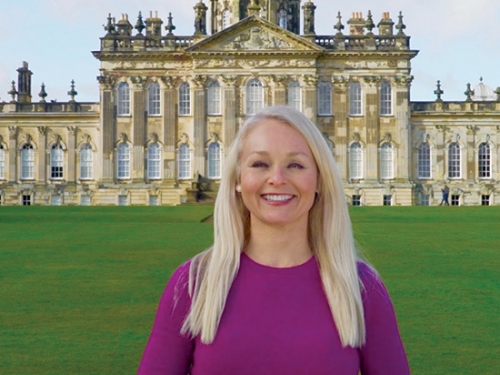 woman in front of castle