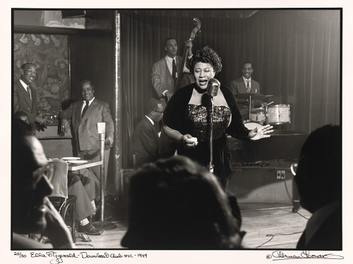 Black and white photo of Ella Fitzgerald in performance