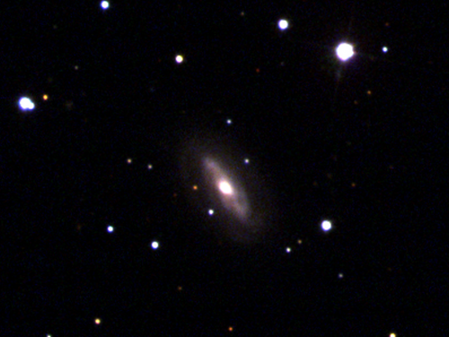 Galaxies and planets lit up in space