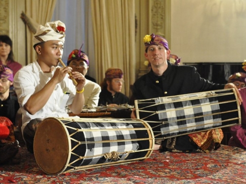 Seated performers with drums