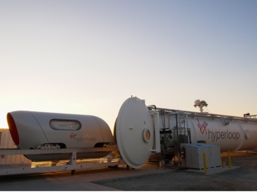 Hyperloop pod outside at sundown