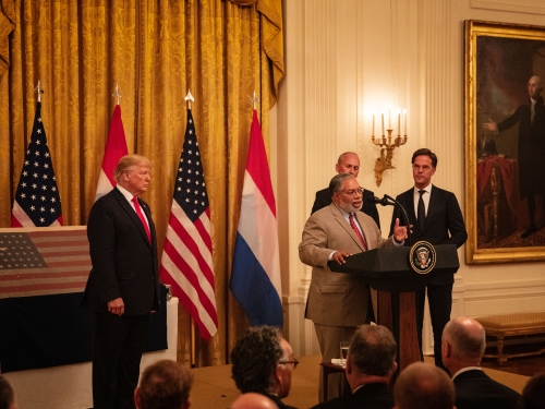 Lonnie bunch accepts flag