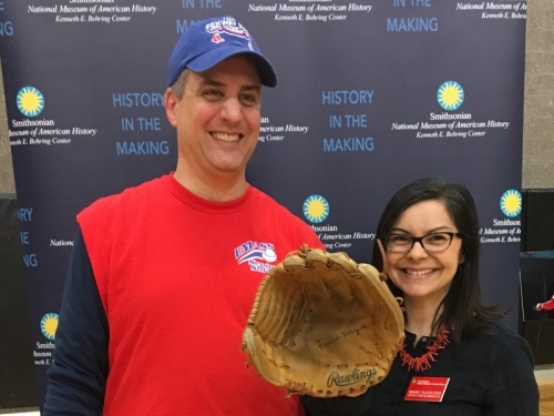 Curator poses with baseball player