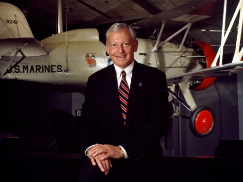 Jack Dailey posed in front of plane