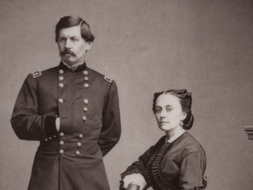 Antique photograph of a man and woman posed