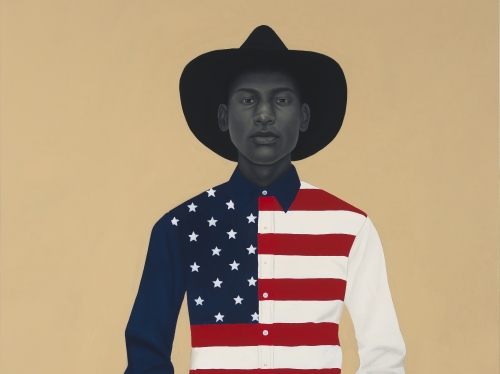 Painting with gold background and dark figure with cowboy hat and American flag-patterned button down.