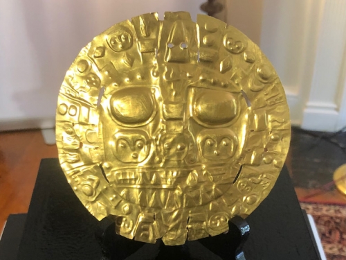 Gold ornament on a stand