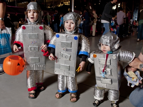 Three children dressed as robots