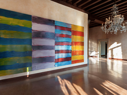 Large painting with multicolored stripes