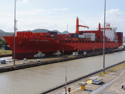 Cargo ship navigating Gatun lock of Panama Canal