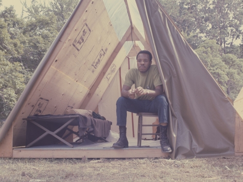 Man sits in tent