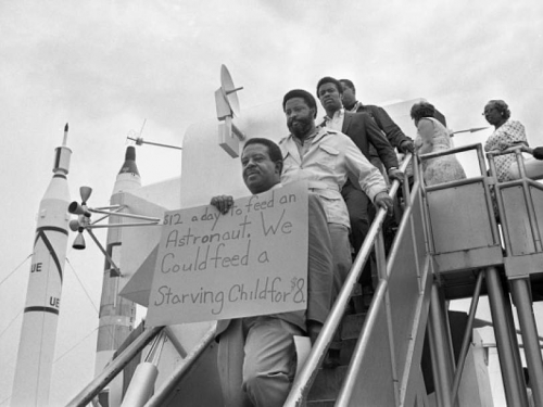Rev. Abernathy, Hosea Williams, and other SCLC Poor People's Campaign members march through the lunar lander