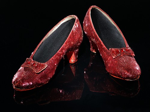 red sequined heels with bows.