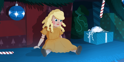 doll in front of Christmas tree