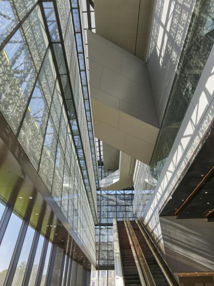 Gallery interior looking up escalator