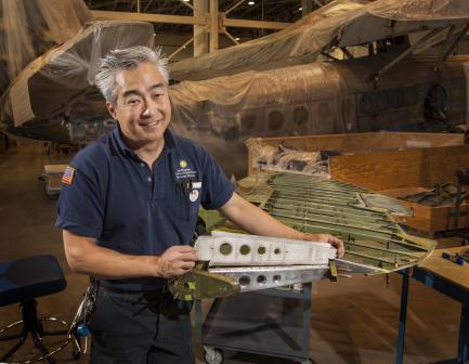 Museum specialist with rudder rib