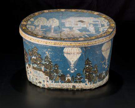 hatbox painted with hot air balloons