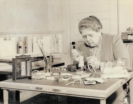 Frances Glessner working on model