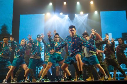 Sill image of dancers