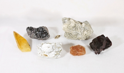 A group of minerals in varying shapes and colors.