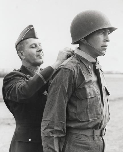 Childers in uniform receives medal