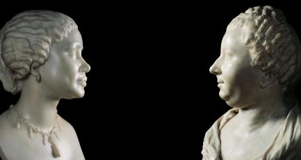 Two busts facing each other
