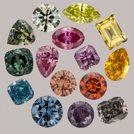 A spiral of diamonds, in a variety of colors and cuts, against a light background.