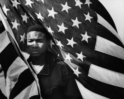 Man carrying American flag