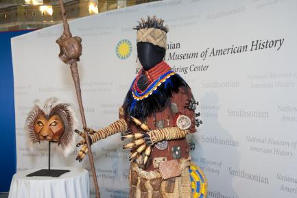 Lion King costumes in display case