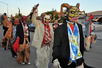 Dancers wearing masks