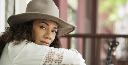 portrait of Martha Redbone wearing hat