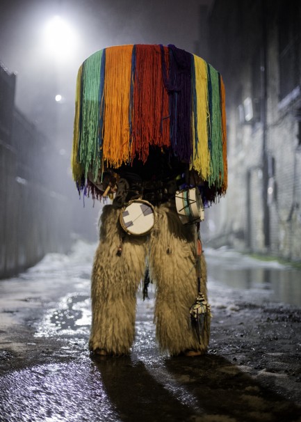 Person completely obscured by colorful headdress