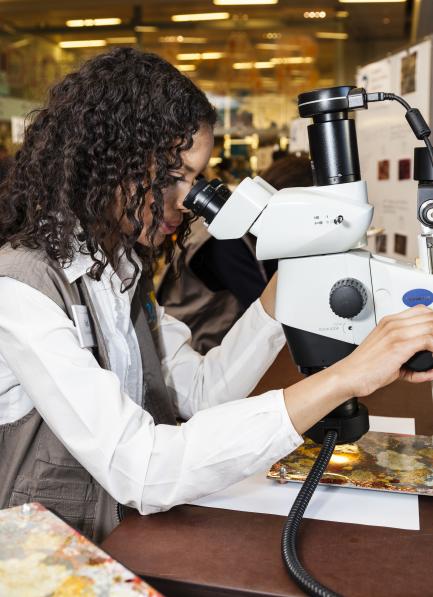 Visitor Uses Microscope