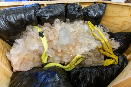 Quartz in box being strapped down