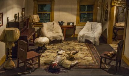 model of parlor with dead body