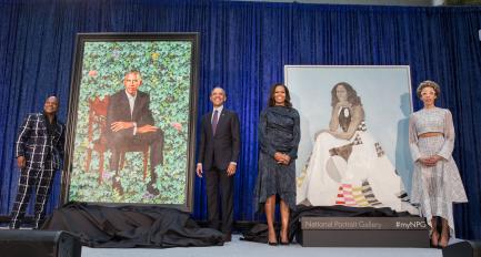 Obamas with their portraitds