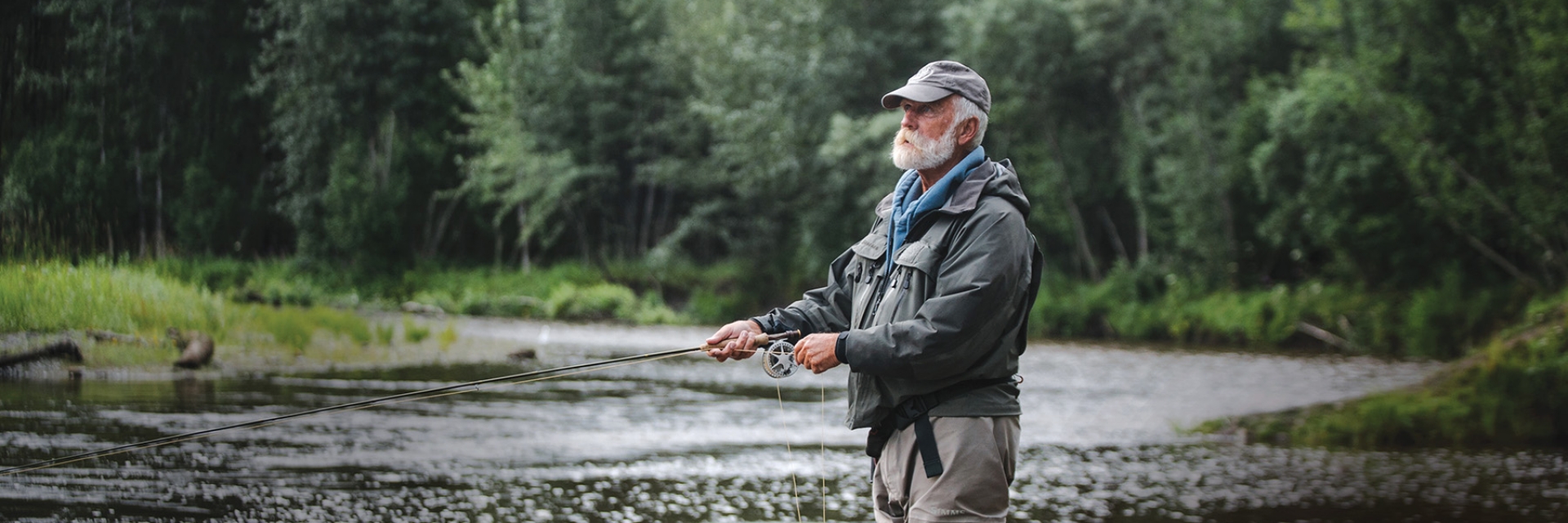 Lynn Whitmore fishing in waders